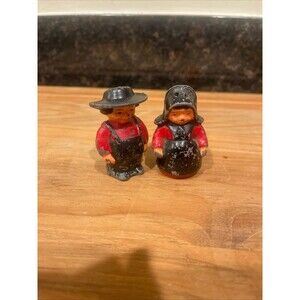Vintage Cast Iron Amish Man And Woman Salt Pepper Shakers